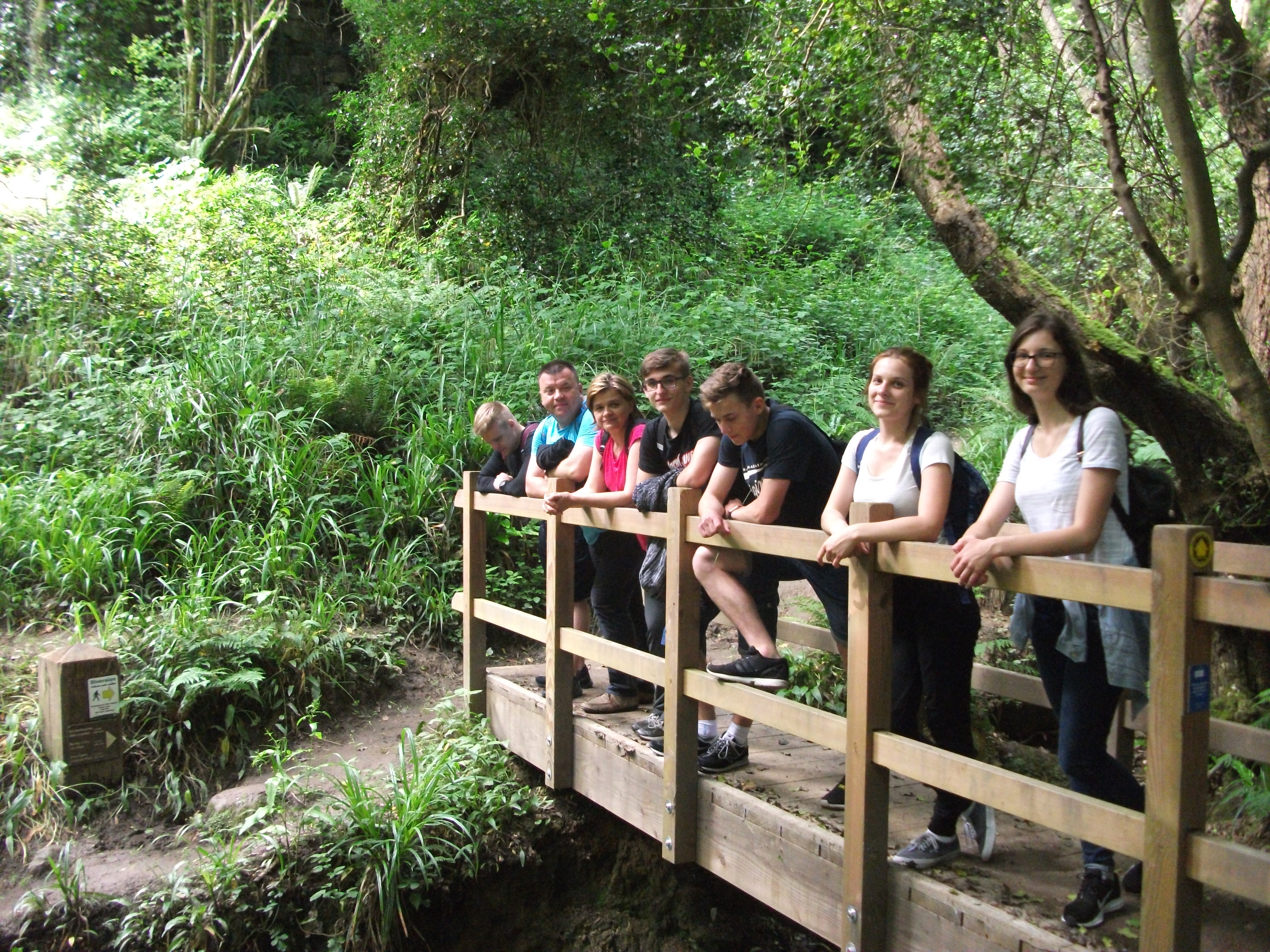 English language students study English in England relax during a countryside walk