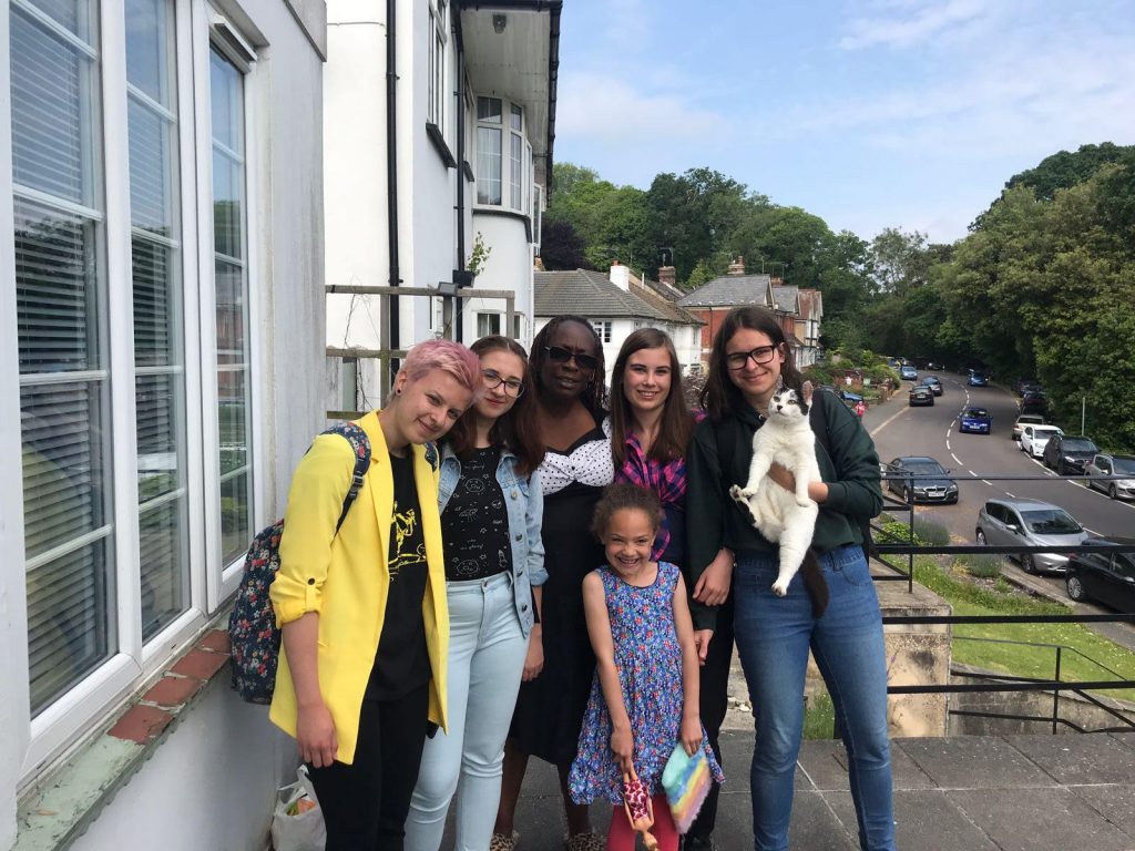live with a host family in England